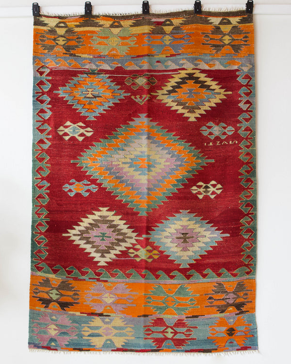 Vintage kilim rug in living room setting, bright colors, wild shaman, soft rug, bold color, Portland, Oregon, rug store, rug shop, local shop, vintage rug, modern kilim, warm colors