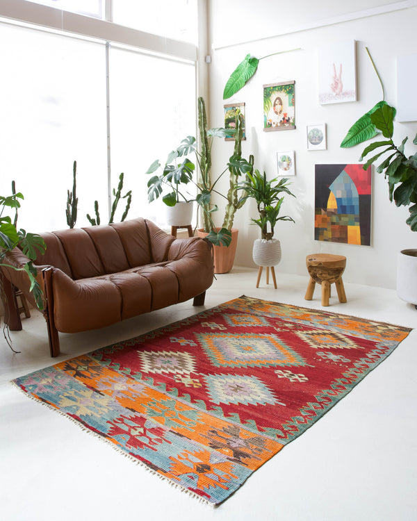 Vintage kilim rug in living room setting, bright colors, wild shaman, soft rug, bold color, Portland, Oregon, rug store, rug shop, local shop, vintage rug, modern kilim, warm colors