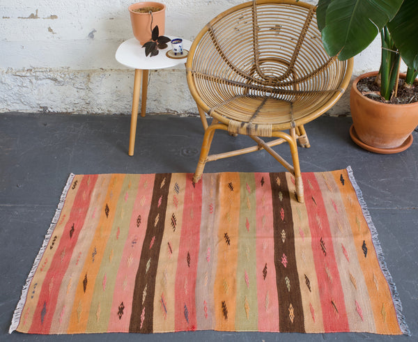 old rug, antique rug, earthy colors, faded colors, turkish rug, vintage rug, flat weave, mini rug, pile rug, Wild Shaman, Portland, Oregon, rug store, rug shop, local shop, kilim rug