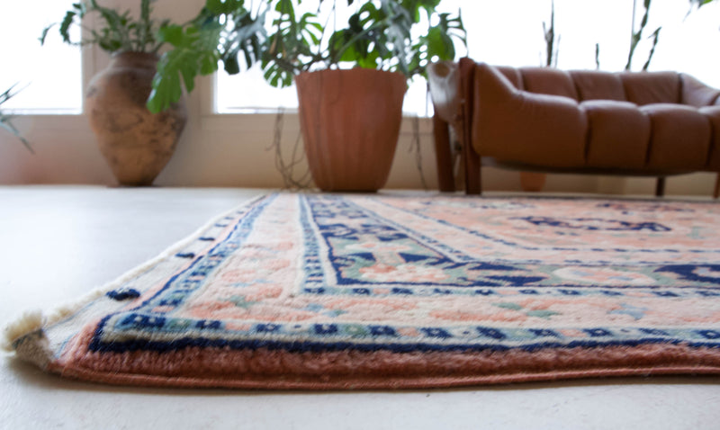Vintage Turkish rug in a living room setting, pile rug, Turkish rug, vintage rug, portland, rug shop, bright colors, wild shaman, soft rug, bold color, Portland, Oregon, rug store, rug shop, local shop,