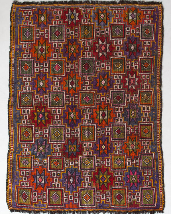 Vintage kilim rug in living room setting, bright colors, wild shaman, soft rug, bold color, Portland, Oregon, rug store, rug shop, local shop, vintage rug, modern kilim, warm colors