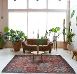 Vintage kilim rug in living room setting, bright colors, wild shaman, soft rug, bold color, Portland, Oregon, rug store, rug shop, local shop, vintage rug, modern kilim, warm colors