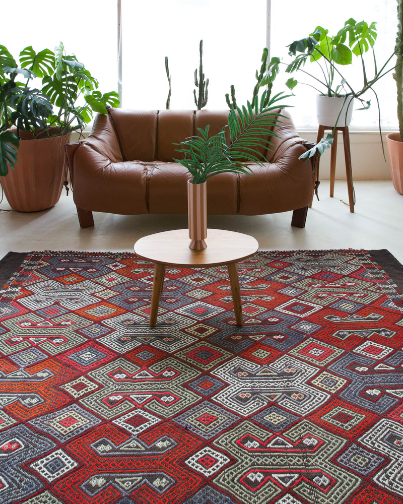 Vintage kilim rug in living room setting, bright colors, wild shaman, soft rug, bold color, Portland, Oregon, rug store, rug shop, local shop, vintage rug, modern kilim, warm colors