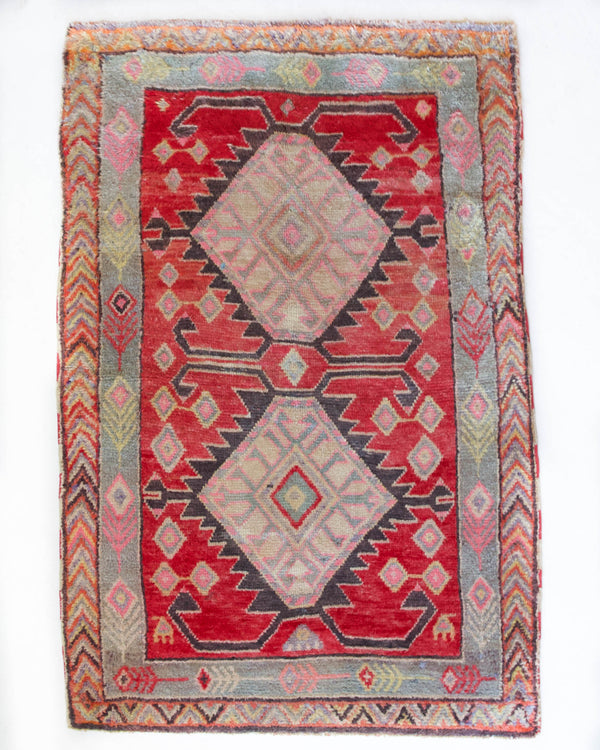 Vintage Turkish rug in living room setting, old rug, antique rug, pastel colors, faded colors, Turkish rug, vintage rug, soft rug, Portland, Oregon, rug store, rug shop, local shop