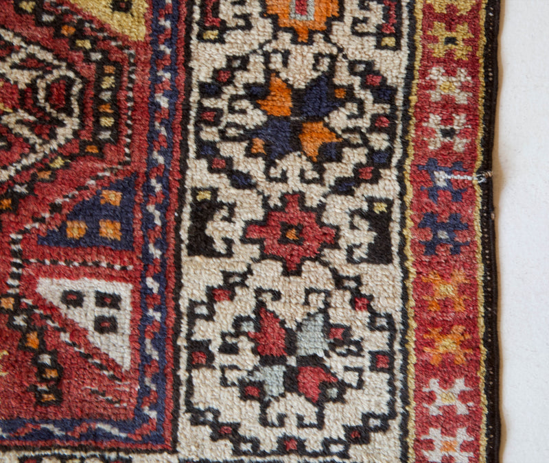  Vintage Turkish runner rug in living room setting, old rug, antique rug, pastel colors, faded colors, Turkish rug, vintage rug, soft rug, Portland, Oregon, rug store, rug shop, local shop