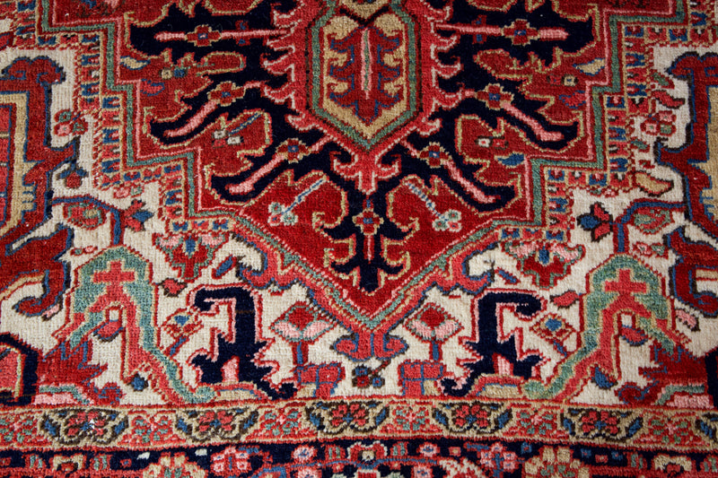 Antique Persian area rug in a living room setting, pile rug, Turkish rug, old rug, antique rug, pastel colors, faded colors, Turkish rug, vintage rug, soft rug, Portland, Oregon, rug store, rug shop, local shop, distressed rug, worn out rug