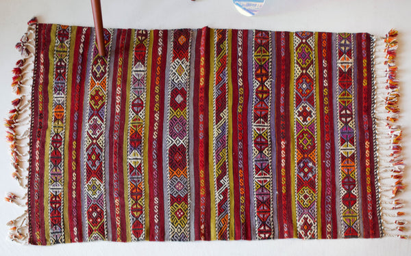 Vintage kilim rug in room decor setting, kilim, Turkish rug, vintage rug, portland, rug shop, bright colors, wild shaman, soft rug, bold color, Portland, Oregon, rug store, rug shop, local shop, antique rug