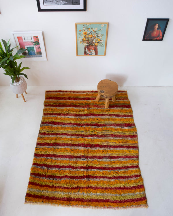 Vintage Turkish rug in a living room setting, pile rug, Turkish rug, vintage rug, portland, rug shop, bright colors, wild shaman, soft rug, bold color, Portland, Oregon, rug store, rug shop, local shop, shag rug, shaggy, plush 