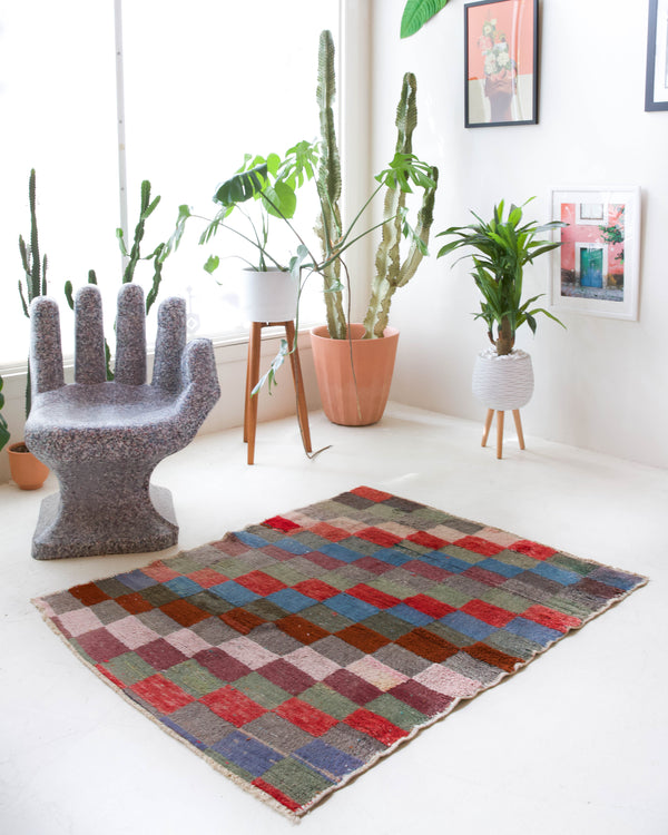 Vintage Turkish rug in a living room setting, pile rug, Turkish rug, vintage rug, portland, rug shop, bright colors, wild shaman, soft rug, bold color, Portland, Oregon, rug store, rug shop, local shop, shag rug, shaggy, plush 