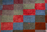 Vintage Turkish rug in a living room setting, pile rug, Turkish rug, vintage rug, portland, rug shop, bright colors, wild shaman, soft rug, bold color, Portland, Oregon, rug store, rug shop, local shop, shag rug, shaggy, plush 