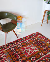 Vintage kilim rug in room decor setting, kilim, Turkish rug, vintage rug, portland, rug shop, bright colors, wild shaman, soft rug, bold color, Portland, Oregon, rug store, rug shop, local shop, antique rug