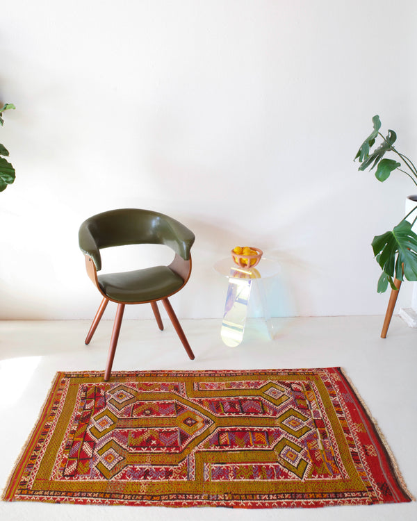 Vintage kilim rug in room decor setting, kilim, Turkish rug, vintage rug, portland, rug shop, bright colors, wild shaman, soft rug, bold color, Portland, Oregon, rug store, rug shop, local shop, antique rug