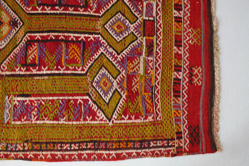 Vintage kilim rug in room decor setting, kilim, Turkish rug, vintage rug, portland, rug shop, bright colors, wild shaman, soft rug, bold color, Portland, Oregon, rug store, rug shop, local shop, antique rug