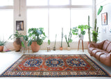 Vintage Turkish rug in a living room setting, pile rug, Turkish rug, vintage rug, portland, rug shop, bright colors, wild shaman, soft rug, bold color, Portland, Oregon, rug store, rug shop, local shop, antique rug