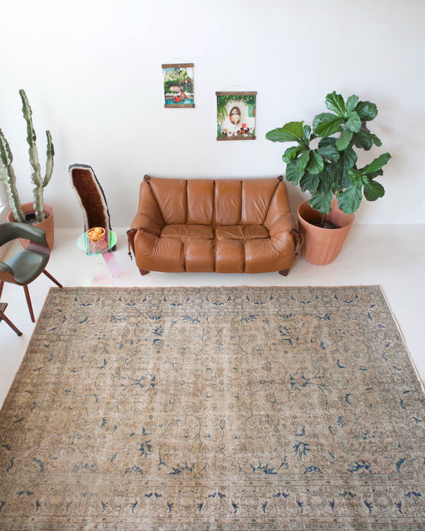 Vintage Turkish rug in living room setting, old rug, antique rug, pastel colors, faded colors, Turkish rug, vintage rug, soft rug, Portland, Oregon, rug store, rug shop, local shop