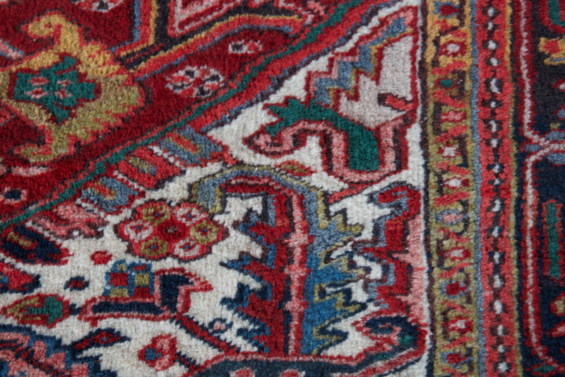  Antique Persian area rug in a living room setting, pile rug, vintage rug, portland, rug shop, bright colors, wild shaman, soft rug, bold color, Portland, Oregon, rug store, rug shop, local shop, antique rug, Persian rug, handmade rug, wool rug, distressed rug