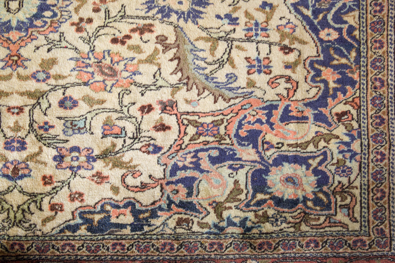 Area rug in a living room setting, pile rug, Turkish rug, old rug, antique rug, pastel colors, faded colors, Turkish rug, vintage rug, soft rug, Portland, Oregon, rug store, rug shop, local shop