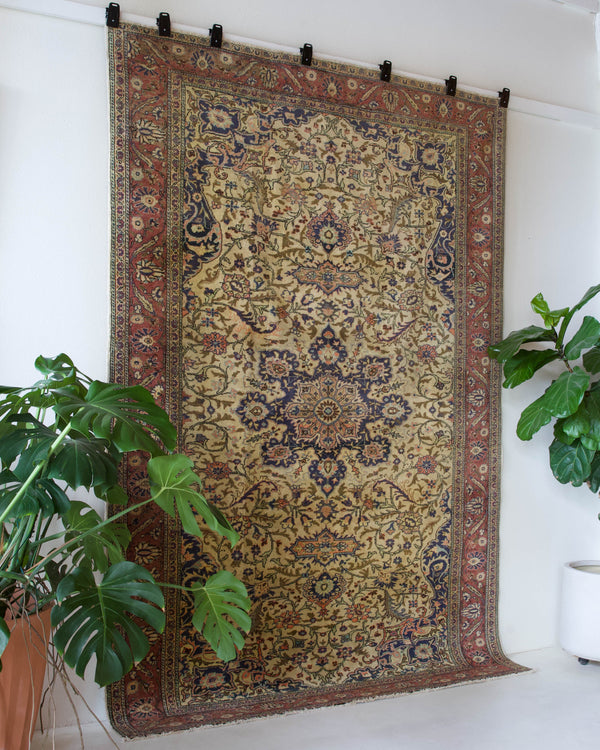 Area rug in a living room setting, pile rug, Turkish rug, old rug, antique rug, pastel colors, faded colors, Turkish rug, vintage rug, soft rug, Portland, Oregon, rug store, rug shop, local shop