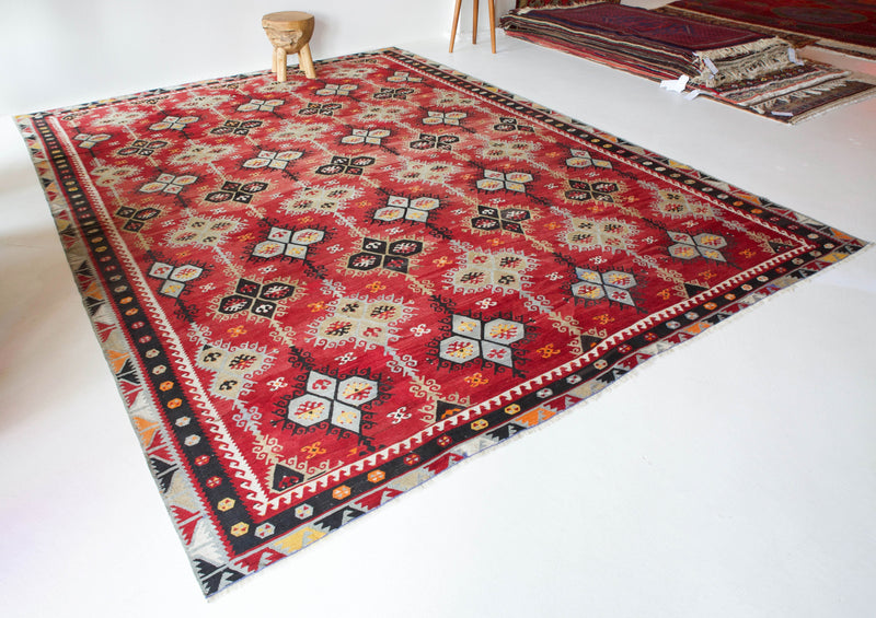 Vintage kilim rug in room decor setting, kilim, Turkish rug, vintage rug, portland, rug shop, bright colors, wild shaman, soft rug, bold color, Portland, Oregon, rug store, rug shop, local shop, antique rug