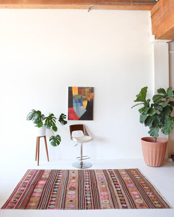 Vintage kilim rug in room decor setting, kilim, Turkish rug, vintage rug, portland, rug shop, bright colors, wild shaman, soft rug, bold color, Portland, Oregon, rug store, rug shop, local shop, antique rug