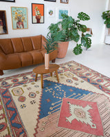 Vintage caucasian rug in a living room setting, pile rug, Turkish rug, vintage rug, portland, rug shop, bright colors, wild shaman, soft rug, bold color, Portland, Oregon, rug store, rug shop, local shop, soft rug, pastel colors, faded colors