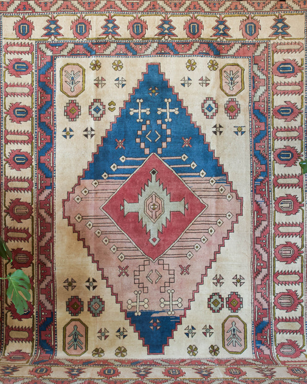 Vintage caucasian rug in a living room setting, pile rug, Turkish rug, vintage rug, portland, rug shop, bright colors, wild shaman, soft rug, bold color, Portland, Oregon, rug store, rug shop, local shop, soft rug, pastel colors, faded colors