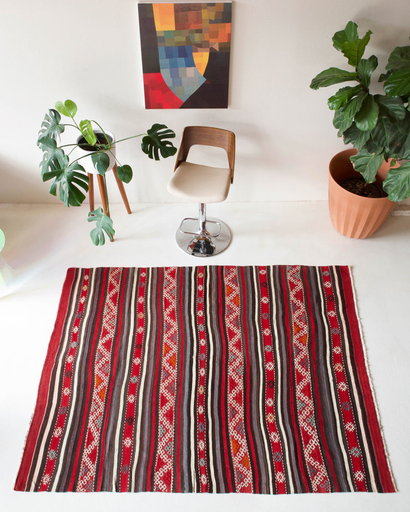 Vintage kilim rug in room decor setting, kilim, Turkish rug, vintage rug, portland, rug shop, bright colors, wild shaman, soft rug, bold color, Portland, Oregon, rug store, rug shop, local shop