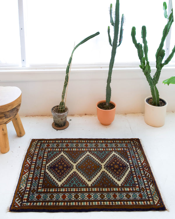 Vintage mini kilim rug in room decor setting, kilim, Turkish rug, vintage rug, portland, rug shop, bright colors, wild shaman, soft rug, bold color, Portland, Oregon, rug store, rug shop, local shop