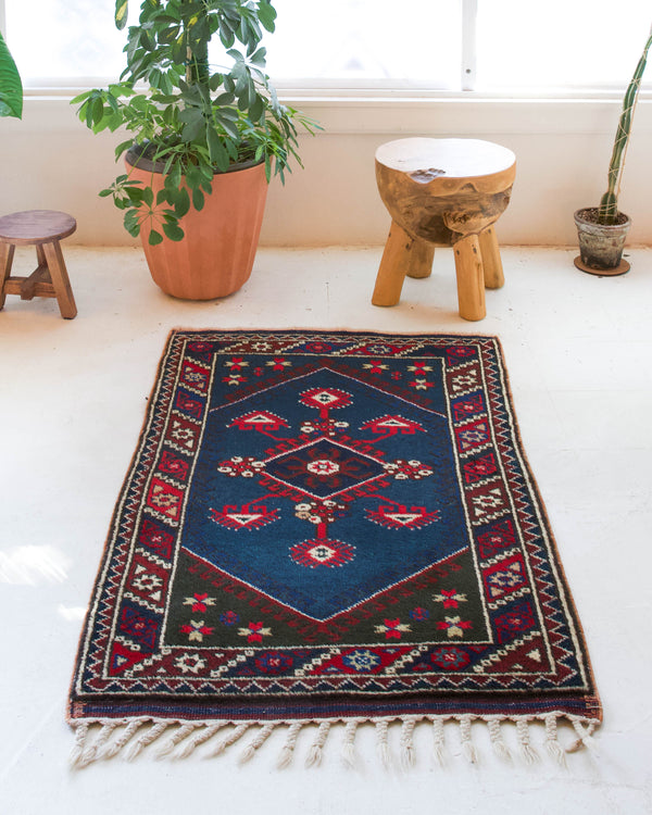 Vintage mini kilim rug in room decor setting, kilim, Turkish rug, vintage rug, portland, rug shop, bright colors, wild shaman, soft rug, bold color, Portland, Oregon, rug store, rug shop, local shop