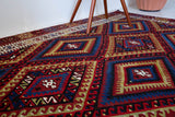 Vintage kilim rug in living room setting, bright colors, wild shaman, soft rug, bold color, Portland, Oregon, rug store, rug shop, local shop, vintage rug, modern kilim, warm colors