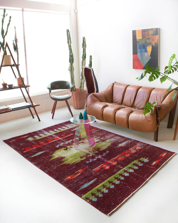 Vintage art deco rug in a living room setting, pile rug, Turkish rug, custom rug, modern rug, art deco rug,  portland, rug shop, bright colors, wild shaman, low pile rug, bold color, Portland, Oregon, rug store, rug shop, local shop, made in Turkey, vintage rug, retro rug