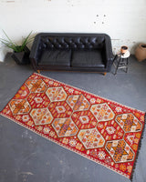 old rug, antique rug, Turkish rug, Portland, Oregon, rug store, rug shop, local shop, bright colors, wild shaman, large rug, area rug, red rug, bold color, burgundy, dark red, flat weave, kilim rug