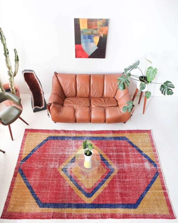 Vintage art deco rug in a living room setting, pile rug, Turkish rug, custom rug, modern rug, art deco rug,  portland, rug shop, bright colors, wild shaman, low pile rug, bold color, Portland, Oregon, rug store, rug shop, local shop, made in Turkey, vintage rug, retro rug