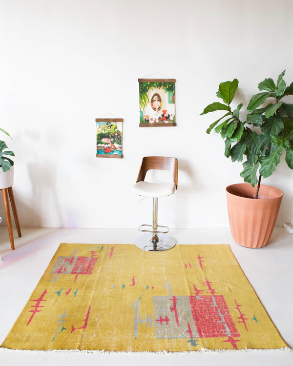 Vintage art deco rug in a living room setting, pile rug, Turkish rug, custom rug, modern rug, art deco rug,  portland, rug shop, bright colors, wild shaman, low pile rug, bold color, Portland, Oregon, rug store, rug shop, local shop, made in Turkey, vintage rug, retro rug