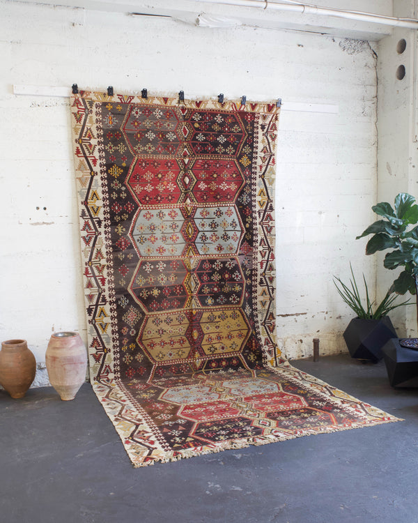 old rug, antique rug, earthy colors, faded colors, Turkish rug, vintage rug, flat weave, kilim rug, large area rug, square rug, Wild Shaman, Portland, Oregon, rug store, rug shop, local shop