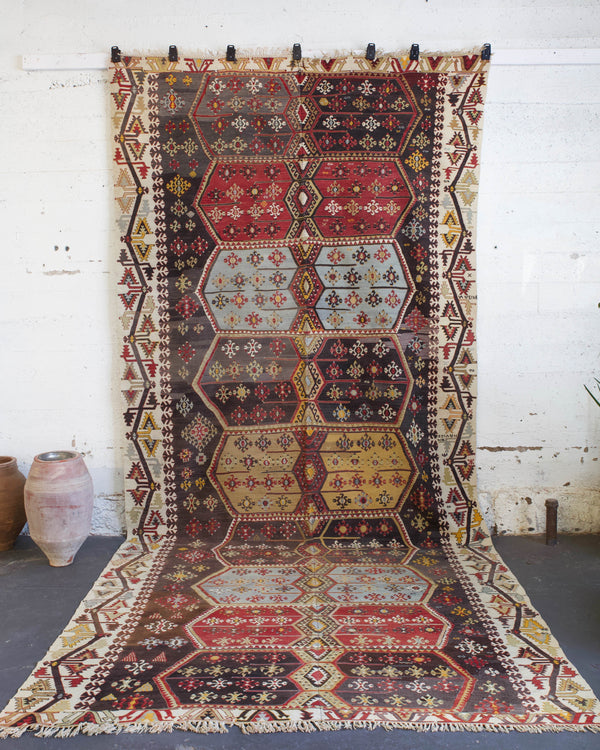 old rug, antique rug, earthy colors, faded colors, Turkish rug, vintage rug, flat weave, kilim rug, large area rug, square rug, Wild Shaman, Portland, Oregon, rug store, rug shop, local shop