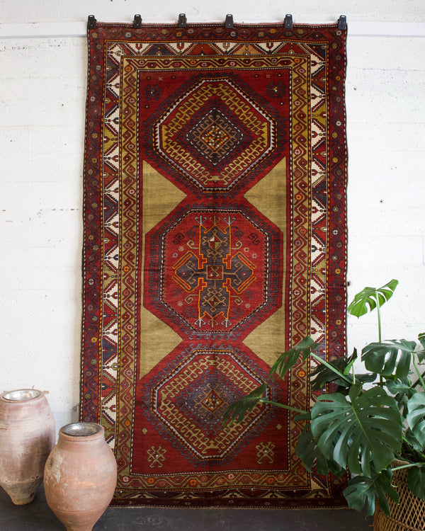 old rug, antique rug, Turkish rug, Portland, Oregon, rug store, rug shop, local shop, bright colors, wild shaman, large rug, area rug, red rug, bold color, burgundy, dark red