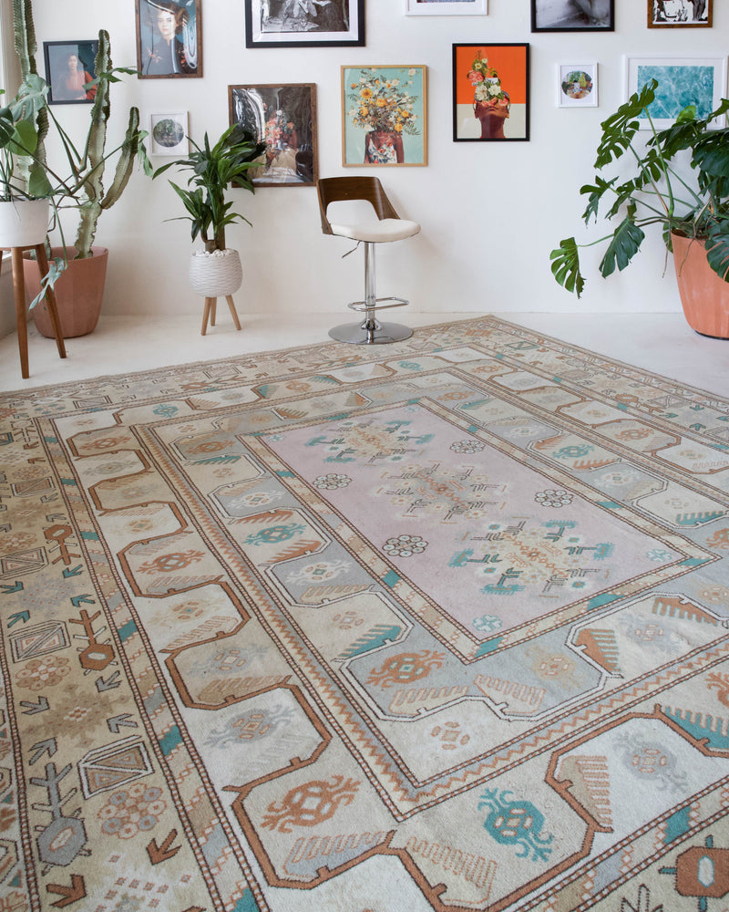 Vintage Turkish runner rug in living room setting, old rug, antique rug, pastel colors, faded colors, Turkish rug, vintage rug, soft rug, Portland, Oregon, rug store, rug shop, local shop