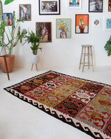 Vintage kilim rug in living room setting, bright colors, wild shaman, soft rug, bold color, Portland, Oregon, rug store, rug shop, local shop, vintage rug, modern kilim, warm colors