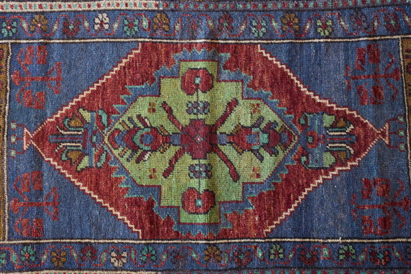 Vintage mini kilim rug in room decor setting, kilim, Turkish rug, vintage rug, portland, rug shop, bright colors, wild shaman, soft rug, bold color, Portland, Oregon, rug store, rug shop, local shop
