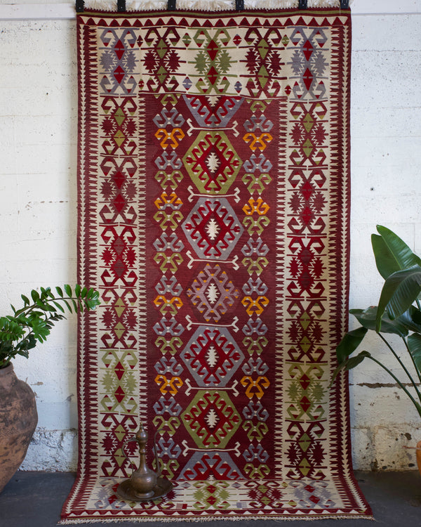 old rug, antique rug, earthy colors, faded colors, Turkish rug, vintage rug, flat weave, kilim rug, large area rug, square rug, Wild Shaman, Portland, Oregon, rug store, rug shop, local shop