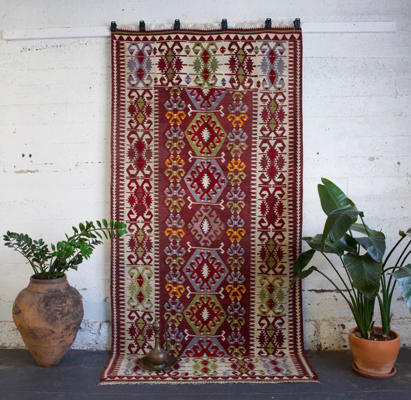 old rug, antique rug, earthy colors, faded colors, Turkish rug, vintage rug, flat weave, kilim rug, large area rug, square rug, Wild Shaman, Portland, Oregon, rug store, rug shop, local shop