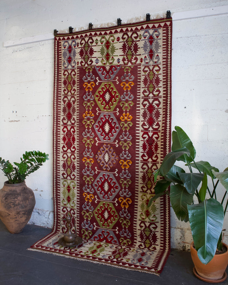 old rug, antique rug, earthy colors, faded colors, Turkish rug, vintage rug, flat weave, kilim rug, large area rug, square rug, Wild Shaman, Portland, Oregon, rug store, rug shop, local shop