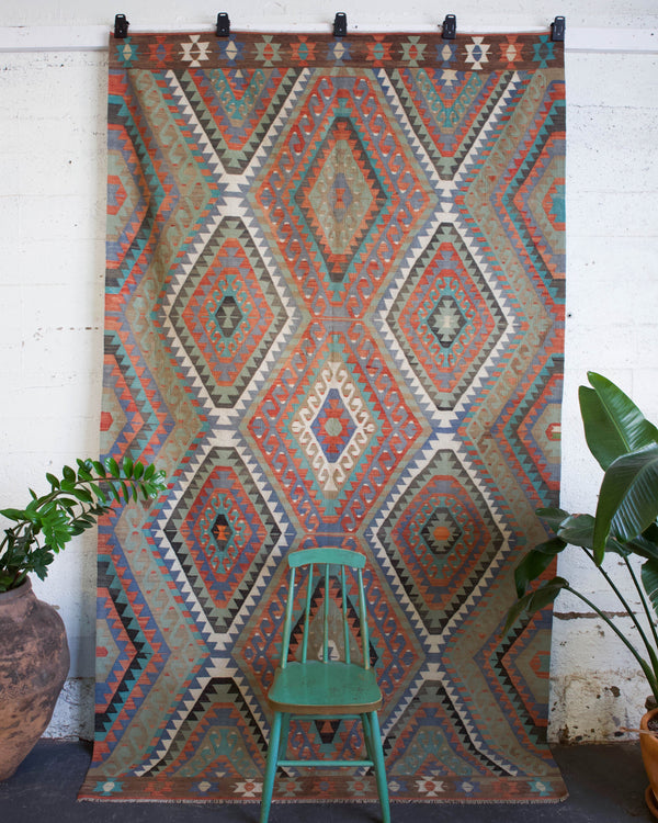 old rug, antique rug, earthy colors, faded colors, Turkish rug, vintage rug, flat weave, kilim rug, large area rug, square rug, Wild Shaman, Portland, Oregon, rug store, rug shop, local shop