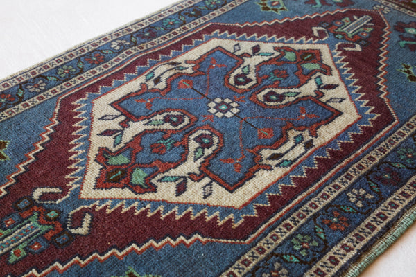 Vintage mini kilim rug in room decor setting, kilim, Turkish rug, vintage rug, portland, rug shop, bright colors, wild shaman, soft rug, bold color, Portland, Oregon, rug store, rug shop, local shop