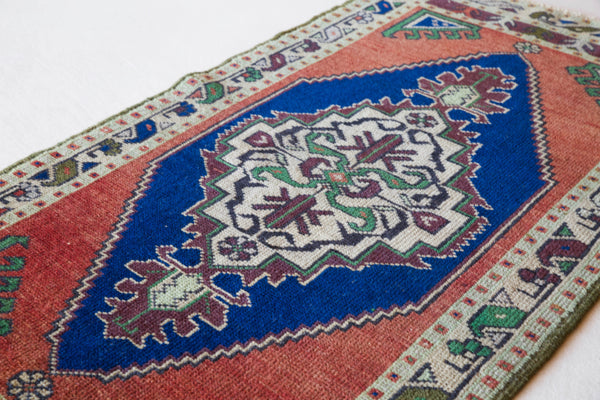 Vintage mini kilim rug in room decor setting, kilim, Turkish rug, vintage rug, portland, rug shop, bright colors, wild shaman, soft rug, bold color, Portland, Oregon, rug store, rug shop, local shop