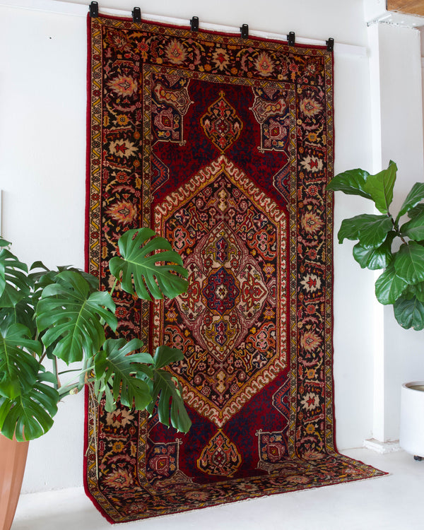  Vintage Turkish rug in a living room setting, pile rug, Turkish rug, vintage rug, portland, rug shop, bright colors, wild shaman, soft rug, bold color, Portland, Oregon, rug store, rug shop, local shop