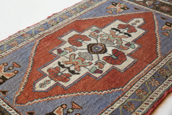 Vintage mini kilim rug in room decor setting, kilim, Turkish rug, vintage rug, portland, rug shop, bright colors, wild shaman, soft rug, bold color, Portland, Oregon, rug store, rug shop, local shop