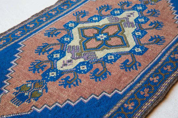 Vintage mini kilim rug in room decor setting, kilim, Turkish rug, vintage rug, portland, rug shop, bright colors, wild shaman, soft rug, bold color, Portland, Oregon, rug store, rug shop, local shop