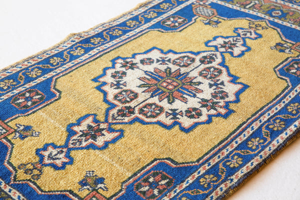 Vintage mini kilim rug in room decor setting, kilim, Turkish rug, vintage rug, portland, rug shop, bright colors, wild shaman, soft rug, bold color, Portland, Oregon, rug store, rug shop, local shop